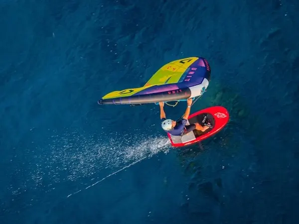 wingfoil essaouira rider gliding atlantic waves beginner lesson
